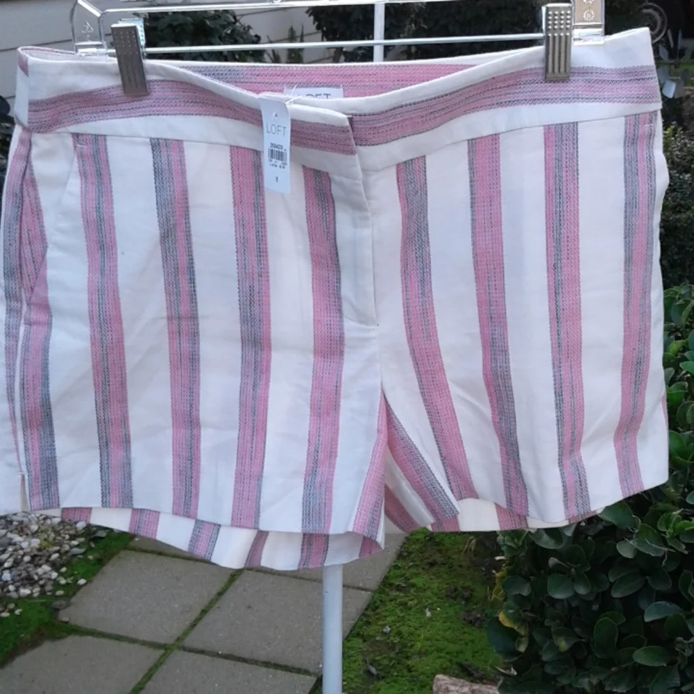 Women's size eight shorts new  with tags  leg in scene three and a half inches